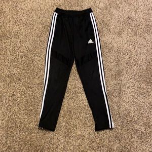 Black and white adidas pants